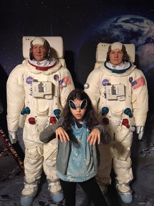 Posing with wax figures (astronauts) at Madame Tussauds Washington DC