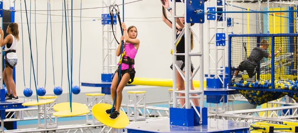 A Girl Doing Rope Climbing in ZavaZone Sterling