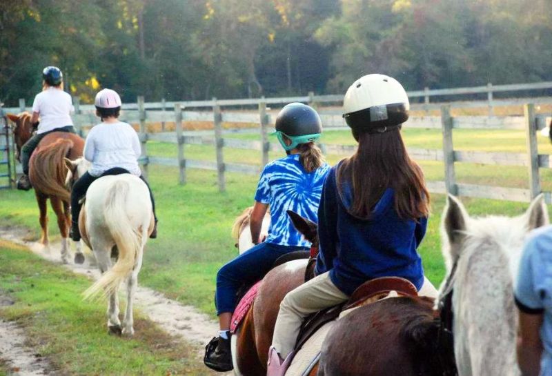 Kids riding horses