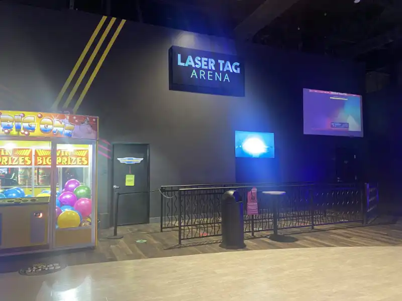 A laser tag machine in Jake's Unlimited, a large room.