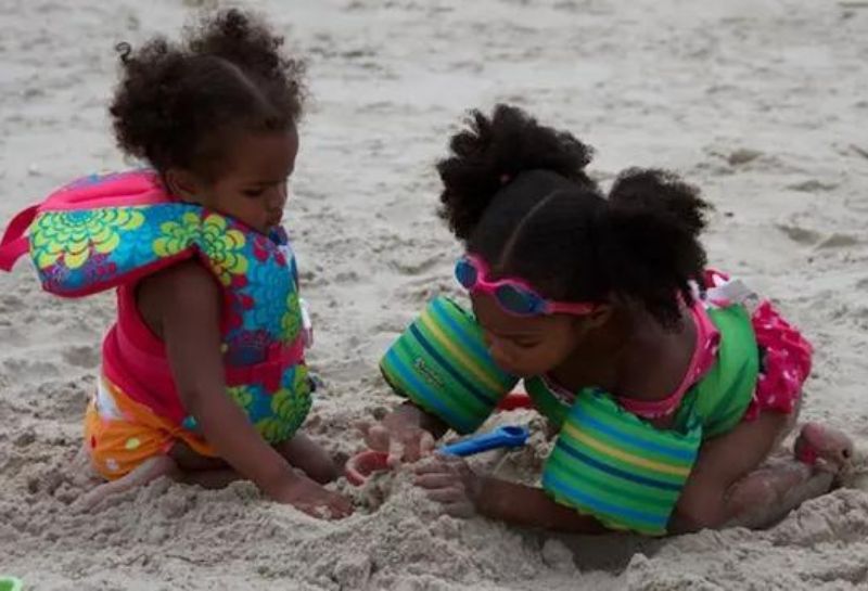 kids playing in the sand at the beach in North Carolina