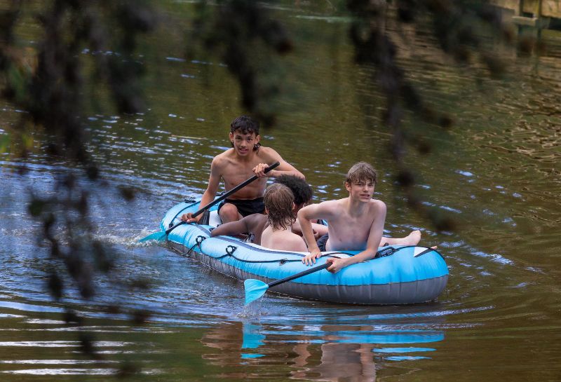 Kids tubing on river