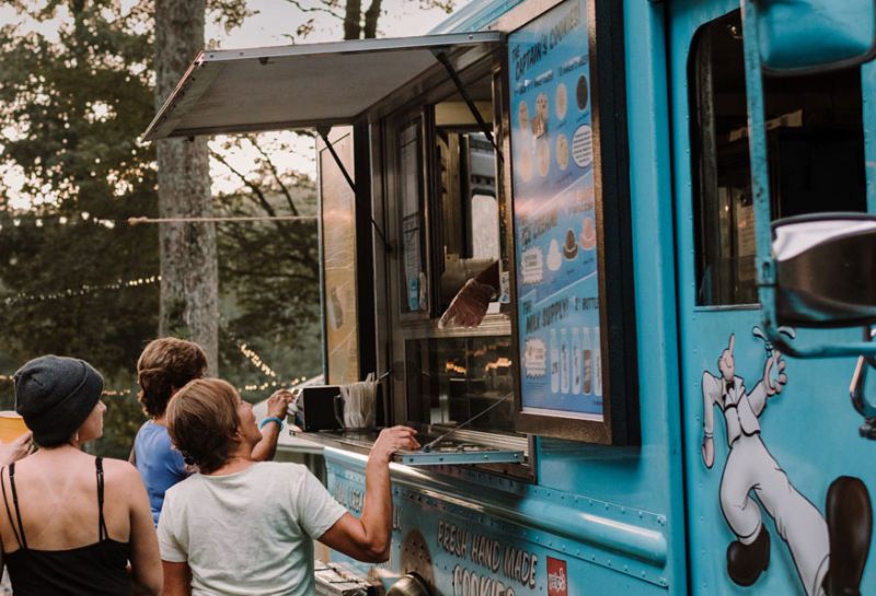 People waiting at the Captain Cookie truck