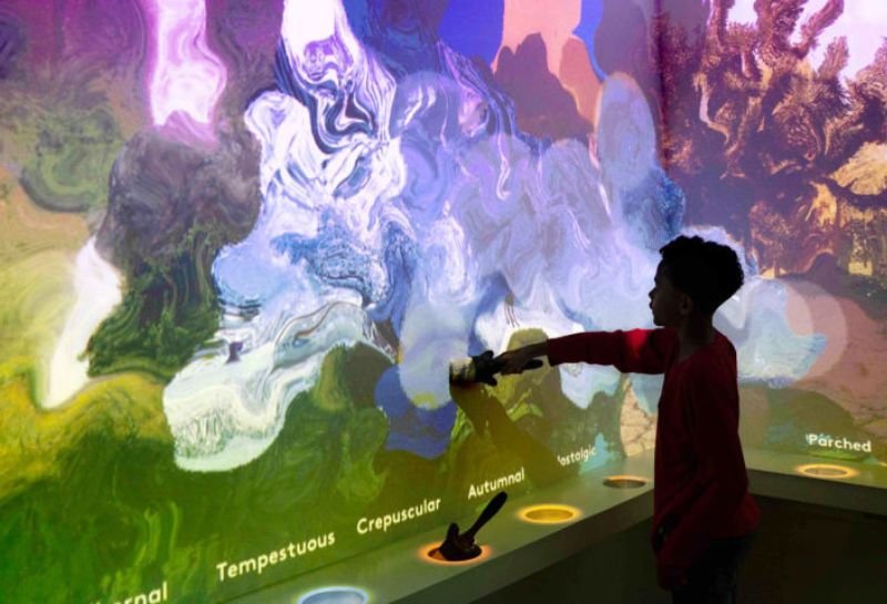 Kids experiencing exhibit at Planet Word Museum