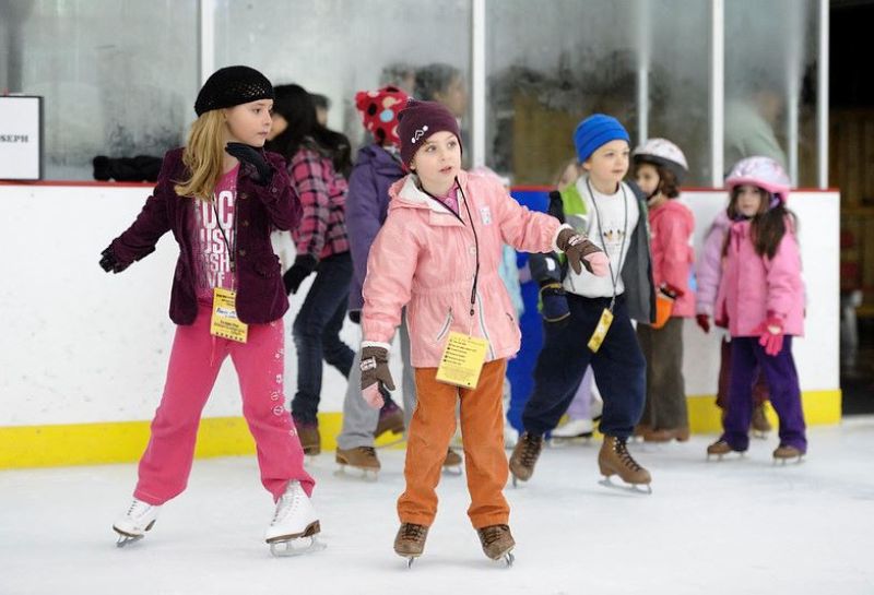 kids skating at Herbert Wells Ice Arena